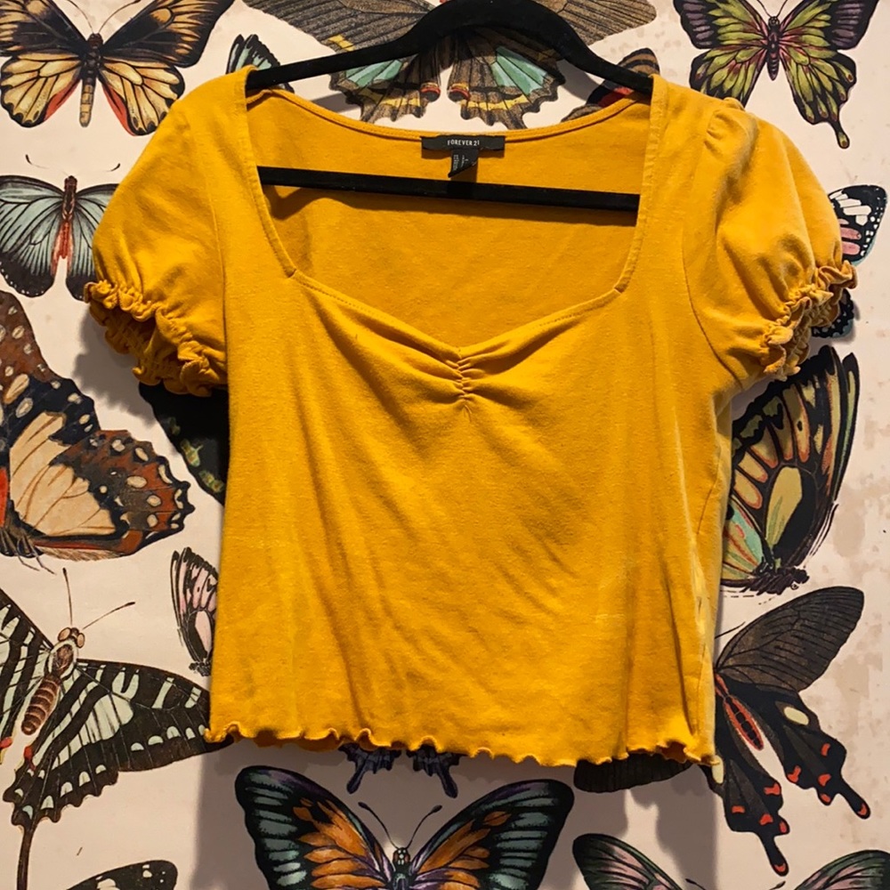 Yellow cropped shirt